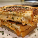A Delicious Chicken Parmesan Grilled Cheese Sandwich