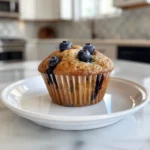 Pile of freshly baked Banana Blueberry Muffins