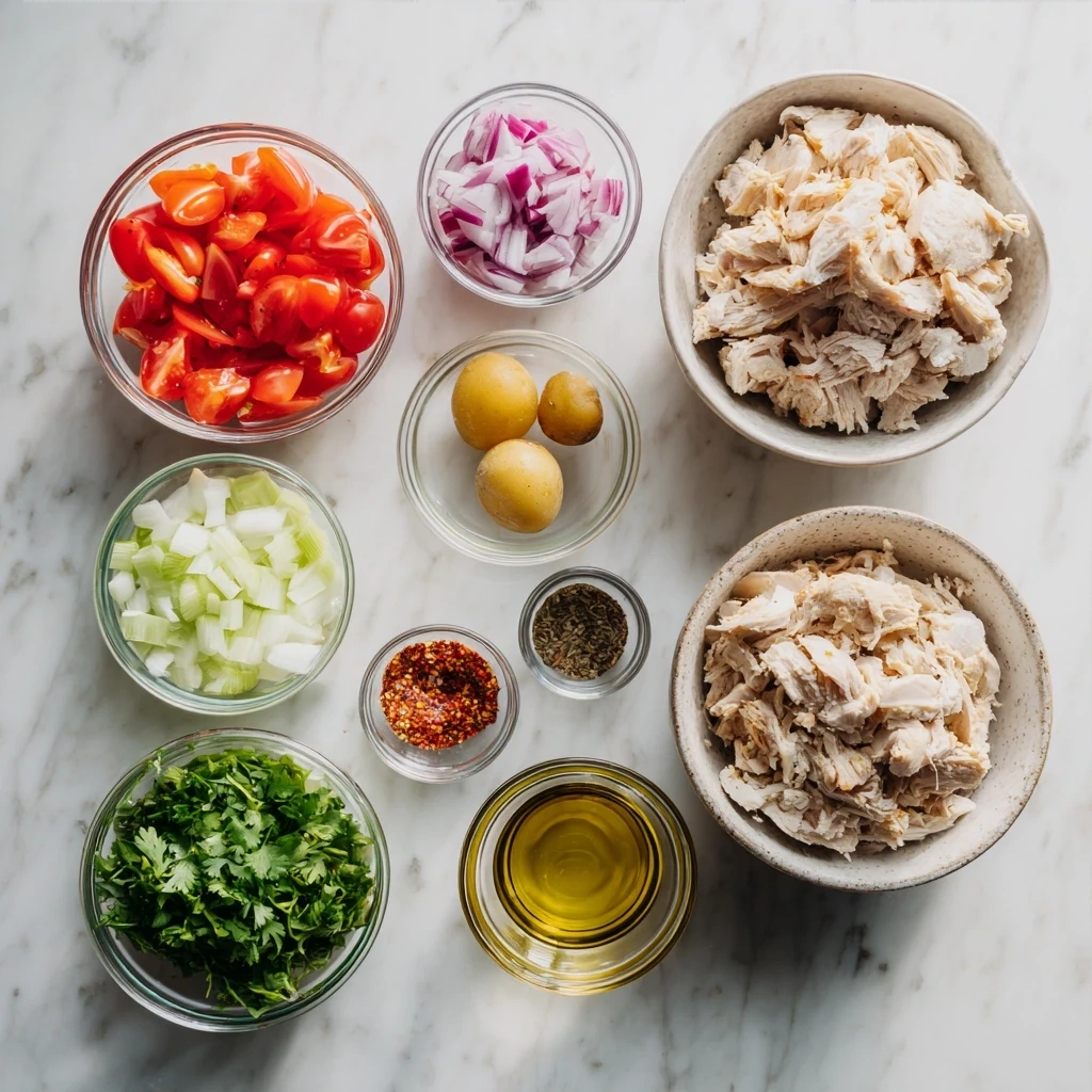 Ingredients for chicken shawarma recipe including chicken thighs, olive oil, lemon juice, garlic, and various spices.