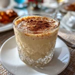 Freshly prepared Puerto Rican Coquito in festive glass